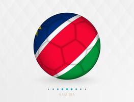 Football ball with Namibia flag pattern, soccer ball with flag of Namibia national team. vector