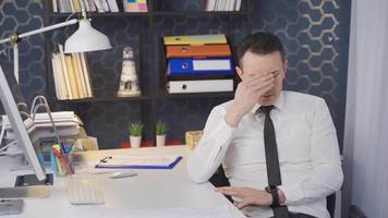 Businessman has job stress. Stressed businessman thoughtful about jobs. video