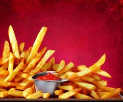 Delicious hot and crispy fried potatoes. Fast food and restaurant products. photo