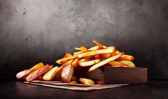 Delicious hot and crispy fried potatoes. Fast food and restaurant products. photo