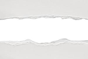 White ripped paper torn edges strips isolated on white background photo