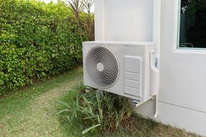 Air condition outdoor unit compressor install outside the house photo