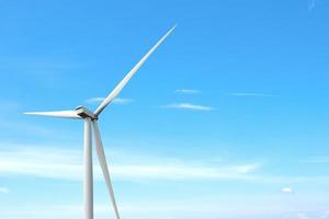 Wind turbine generate electricity with blue sky. photo
