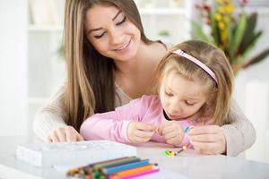 Cute little girl with mother photo