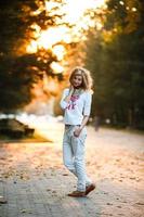 beautiful girl in sunset light photo