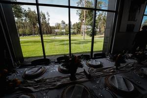 View of the lawn through the window of the banquet hall photo