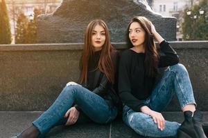 Two young adult girls photo