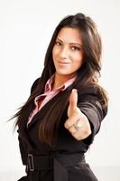 Businesswoman thumbs up photo