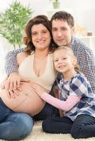 Happy Family Expecting A New Baby photo
