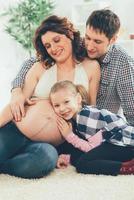 Happy Family Expecting A New Baby photo