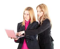 Two Businesswomen view photo