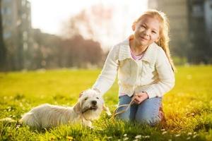 Little Girl With Her Puppy Dog photo