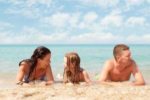 Family at the beach photo