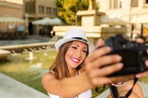 Beautiful Girl Taking A Selfie photo