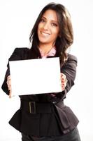 Businesswoman holding card photo