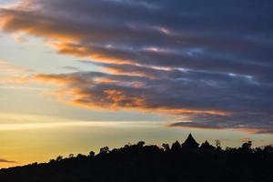 silhouette hill mountian sunset with beautiful cloud orange sky photo