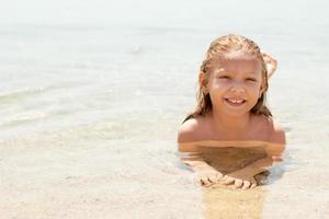 Little girl at beach photo