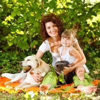 Mother and daughter with pets photo