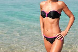 Young woman in the beach photo