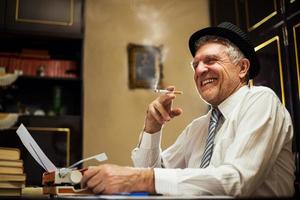 Retro Senior Man Writer With A Cigarette photo