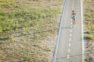 Middle Age Sportswoman Jogging Outdoor photo