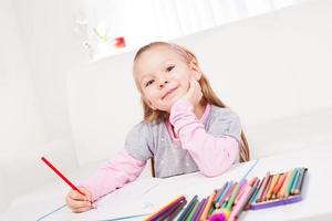 Little Girl With Colored Pencils photo