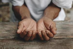 Male wrinkled hands, old man is wearing photo