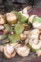 waste of young coconuts in the highway area photo