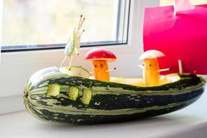 crafts from zucchini for kindergarten on the windowsill photo