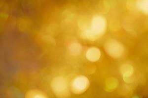 abstract bokeh background. christmas bokeh. Yellow blurred background. golden glow photo