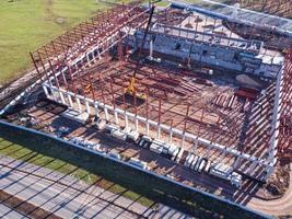 Samara, Samara region, 2022 - Construction site with truck cranes and elements of the metal frame of the building. photo