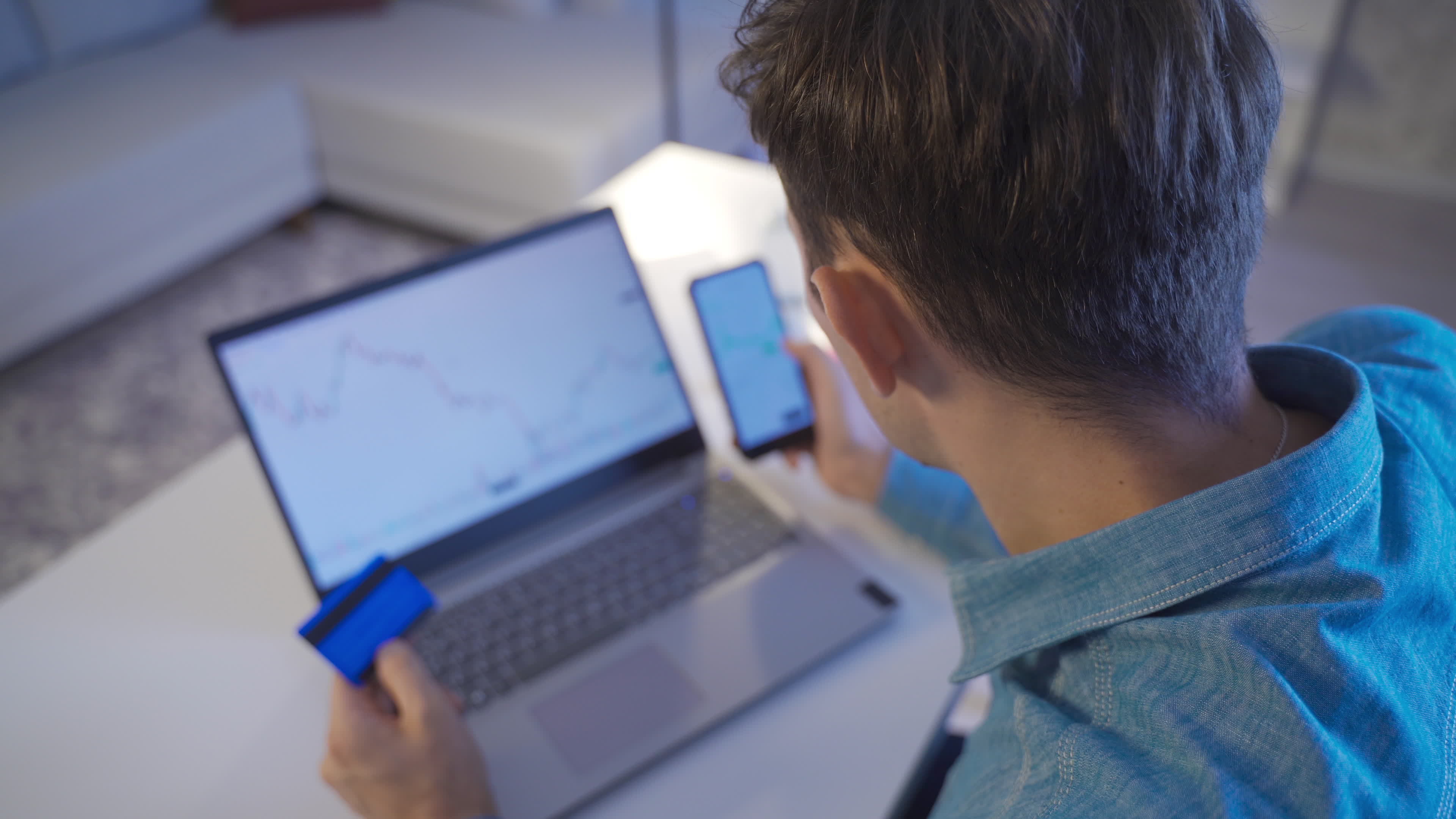 Man buying crypto money with credit card. Stock market investor young