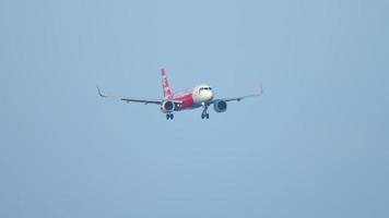 PHUKET, THAILAND DECEMBER 1, 2018 - AirAsia Airbus 320 9M AGB approaching before landing, International Phuket Airport video