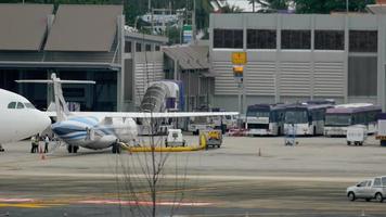 PHUKET, THAILAND DECEMBER 3, 2016 - Thomas Cook Scandinavia Airbus 330 OY VKF taxiing after landing in Phuket airport. View from the top floor of the hotel Centara Grand West Sands Resort Phuket video