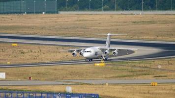 FRANKFURT AM MAIN, GERMANY JULY 19, 2017 - British Aeroapace 146 Avro RJ85 taxiing after landing on runway 25R. Fraport, Frankfurt, Germany video