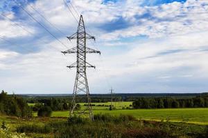 Support of high-voltage transmission line against the sky photo