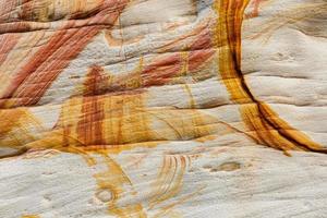 Natural stone texture, yellow brown stripes on the stone, background photo