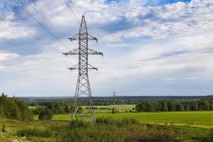 Support of high-voltage transmission line against the sky photo