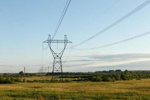 support of high-voltage power line in the field. photo