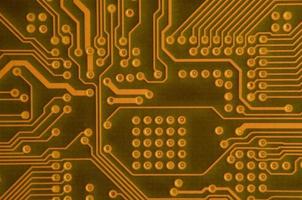 Close up of colored micro circuit board. Abstract technology background photo
