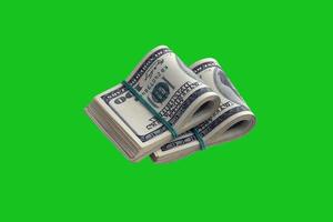 Bundle of US dollar bills isolated on chroma keyer green. Pack of american money with high resolution on perfect green mask photo