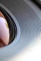 Photo Camera lens close up macro view. Concept of photographer or camera man job