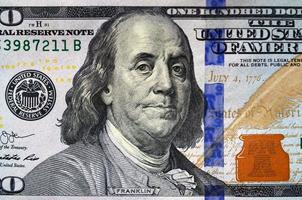 Macro shot. Hundred US dollar bill close up photo