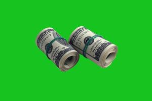 Bundle of US dollar bills isolated on chroma keyer green. Pack of american money with high resolution on perfect green mask photo