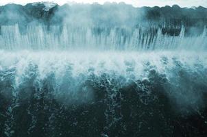 Falling water with strong bursts photo
