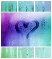 A collage of many different fragments of glass, decorated with rain drops from the condensate and painted heart in center photo