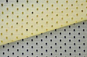 Yellow mesh sport wear fabric textile background pattern photo