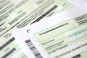 German annual income tax return declaration form for 2022 year close up. The concept of tax reporting in Germany photo