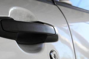 Close up black car door handle. Car equipment photo