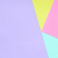 fondo de textura de colores pastel de moda. papeles con motivos geométricos rosas, violetas, amarillos y azules. resumen mínimo foto